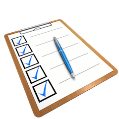 A checklist on a clipboard and a pen and no background